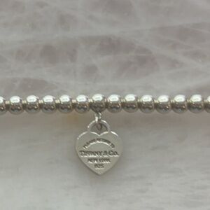 Return to Tiffany sterling silver heart bracelet.